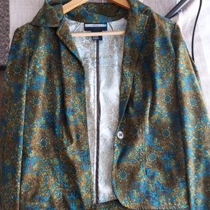 Requirements multicolor floral jacket. Size small.